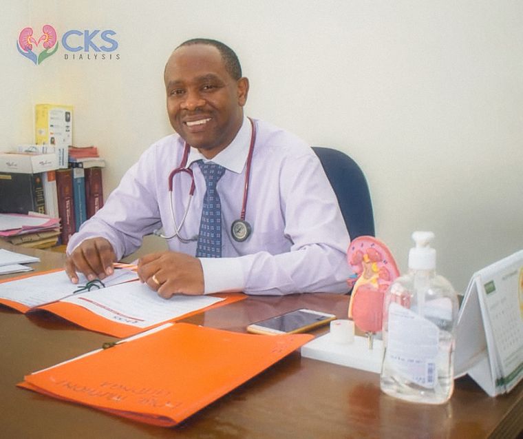 Dr. Jonathan Wala, nephrologist and medical director, at his desk